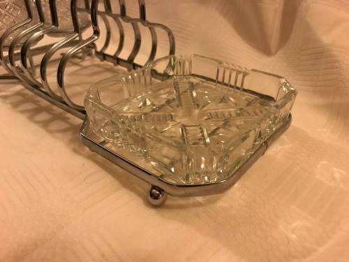Chromed toast rack with butter dish and shares