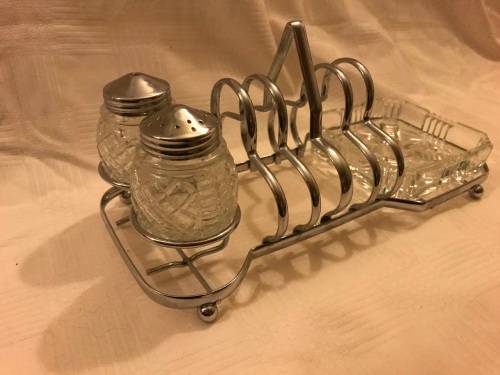 Chromed toast rack with butter dish and shares