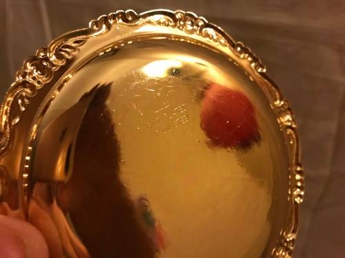 Set of brass coasters for auction