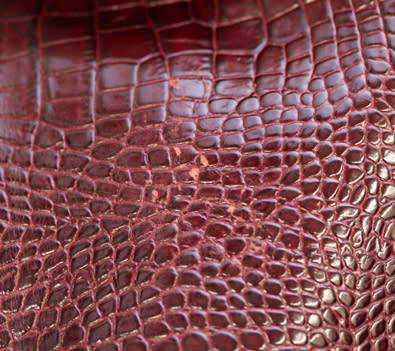 PAUL COSTELLOE DRESSAGE SADDLEBAG HANDBAG. CREAM FABRIC WEAVE WITH BURGUNDY PATENT LEATHER DETAILS