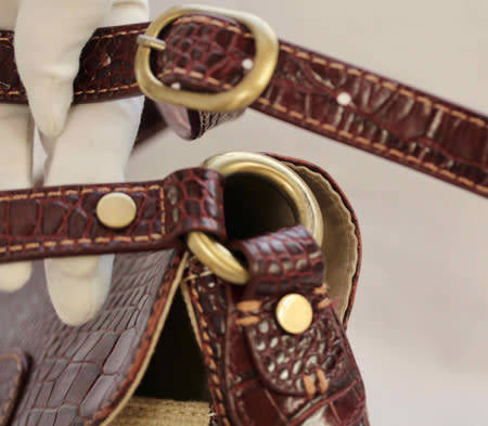PAUL COSTELLOE DRESSAGE SADDLEBAG HANDBAG. CREAM FABRIC WEAVE WITH BURGUNDY PATENT LEATHER DETAILS