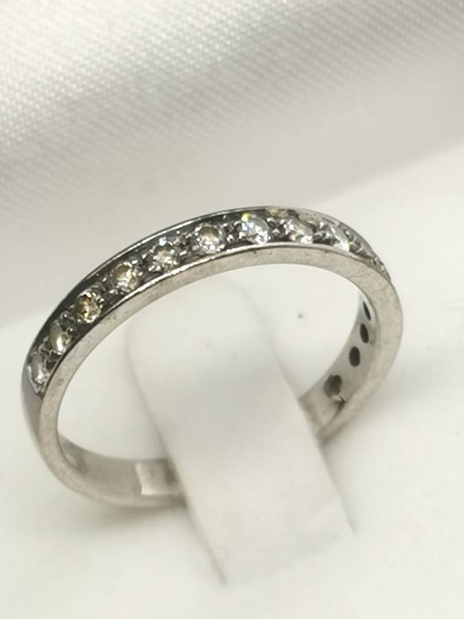 White gold and diamond half eternity ring