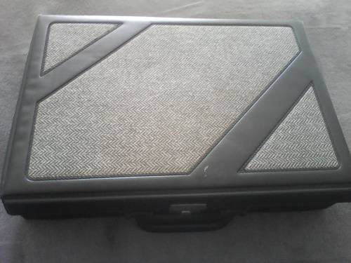 32 Assorted Tapes + Carry Case (Sold as one Lot)