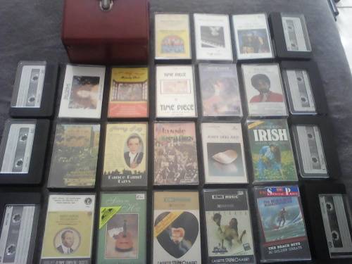 25 x Assorted Tapes + Small Carry Case (Sold as one Lot)