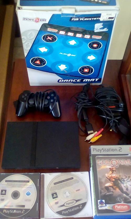 PlayStation 2 Console + Dance Mat + 1 Controller + Power Cable + RCA Cable + 16 Games