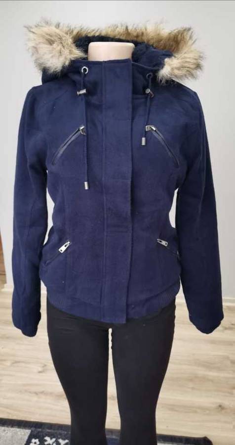Beautiful Navy Suede feel jacket with fur trim hood. ..well padded