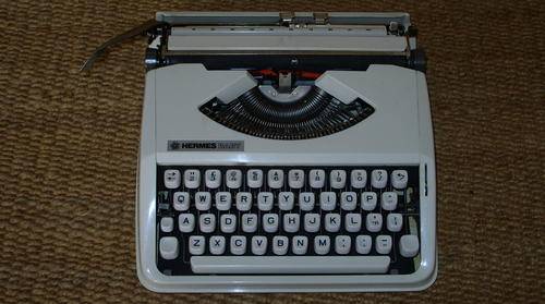 HERMES BABY TYPEWRITER WITH COVER