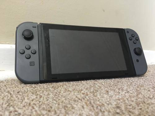 Nintendo switch   (plus mario kart 8 deluxe edition)
