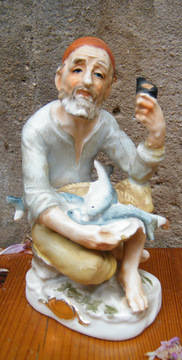 Man with basket of fish Figurine (14.5cm tall)