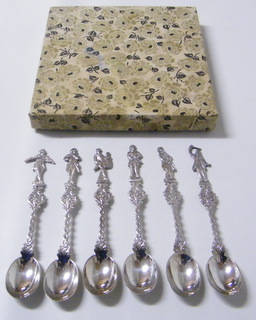 Silver Plated spoons with ornate handles and Musicians playing different instruments on the handles