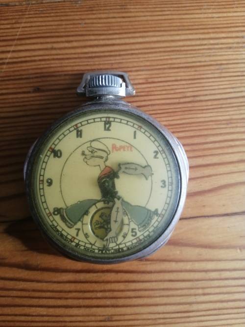 Vintage New Haven Popeye Character dollar pocket watch 1935, working but needs a service