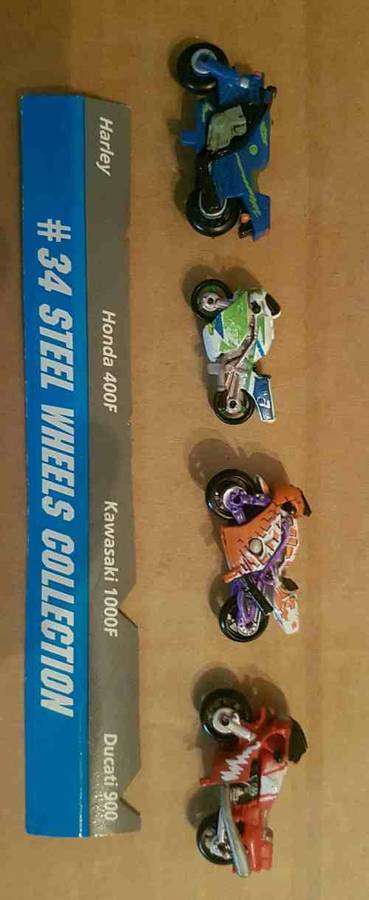 MICRO MACHINES #34 STEEL WHEELS COLLECTION 1996 COMPLETE SET OF 4