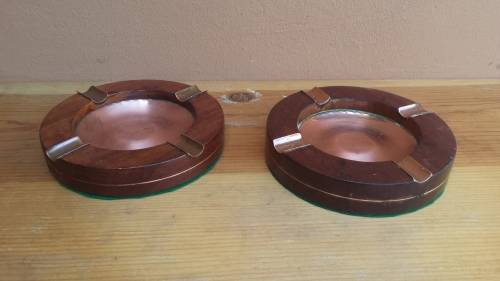 Lovely pair of old wood and copper ashtrays.