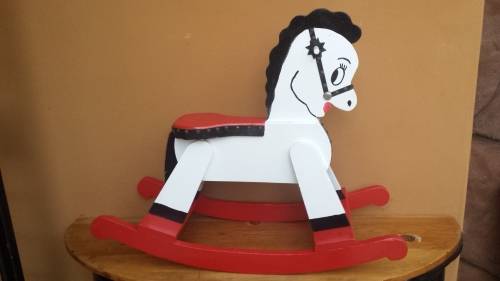 Beautiful red, white & black toddlers rocking horse.