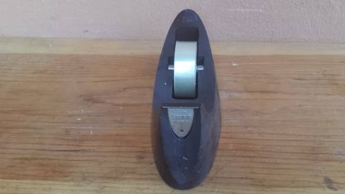 Small old tape dispenser.
