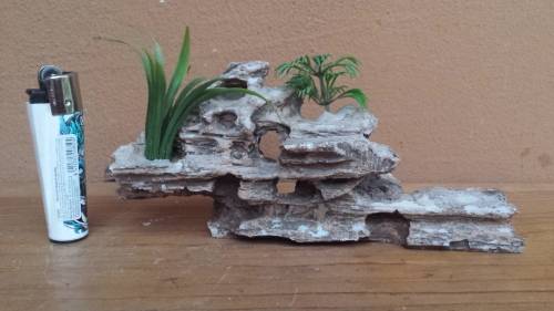 Collection of fish tank coral and accessories.