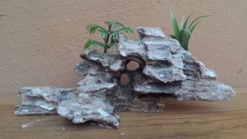 Collection of fish tank coral and accessories.
