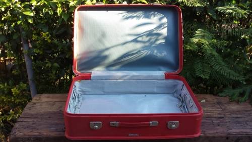 Lovely old red Revelation suitcase.