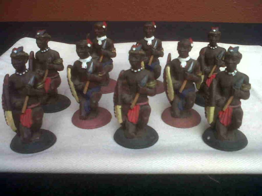 SET OF 9 SMALL CLAY AFRICAN FIGURINES.