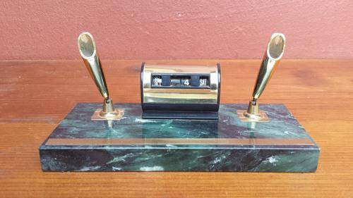 Marble base pen holder.