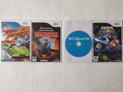 Nintendo Wii Console + 4 Games
