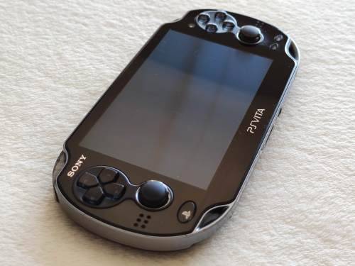 Playstation Vita Console + 4GB Memory Card (Model 1004 - Wifi Only)