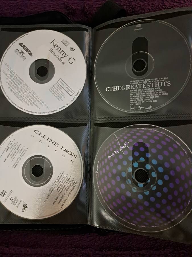 Music CDS. WITH POUCH ABOUT 60CDS MUSIC MUSIC