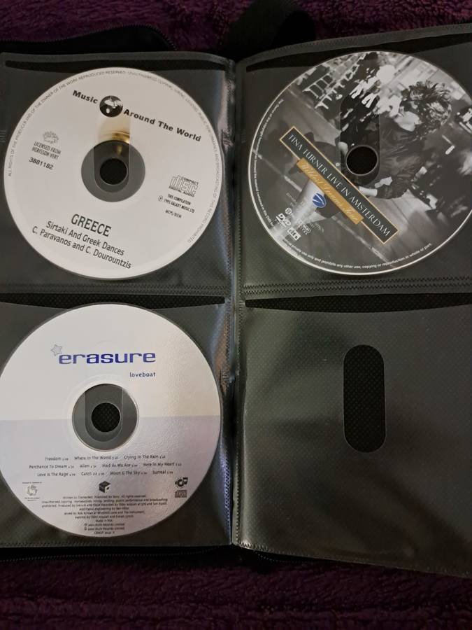 Music CDS. WITH POUCH ABOUT 60CDS MUSIC MUSIC