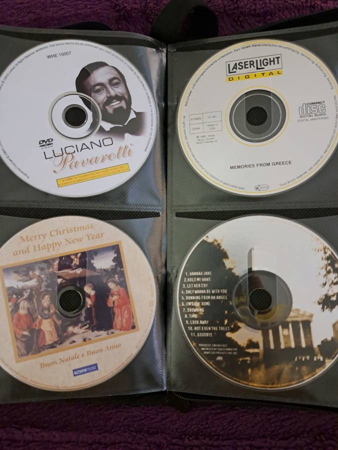 Music CDS. WITH POUCH ABOUT 60CDS MUSIC MUSIC