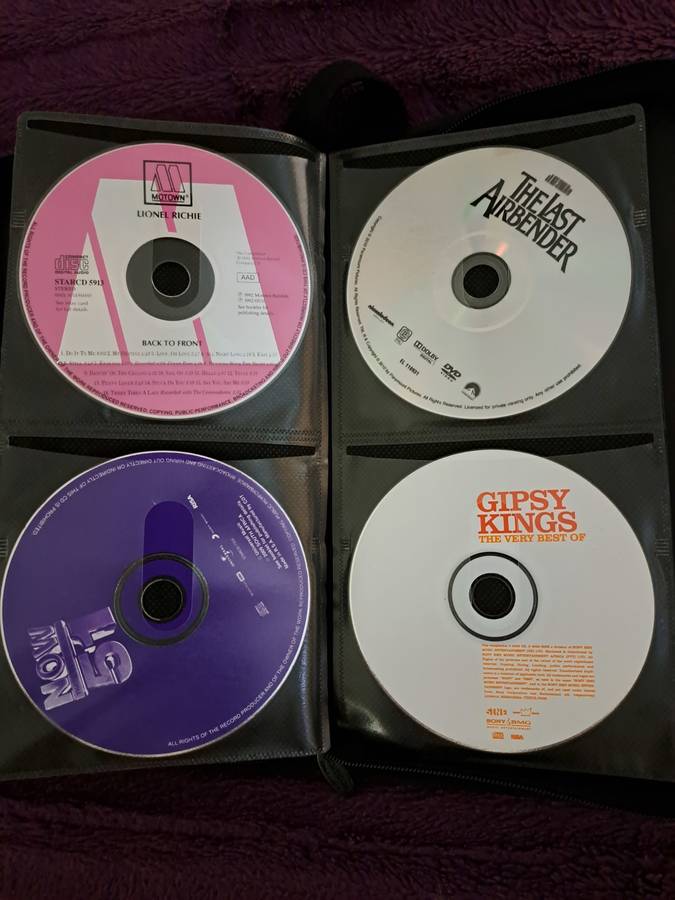 Music CDS. WITH POUCH ABOUT 60CDS MUSIC MUSIC