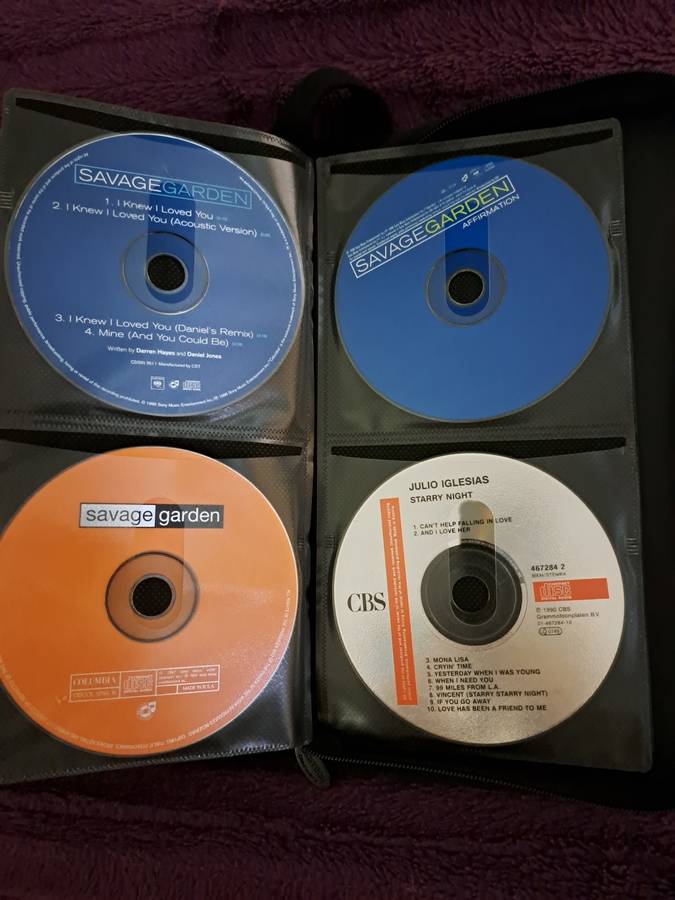 Music CDS. WITH POUCH ABOUT 60CDS MUSIC MUSIC