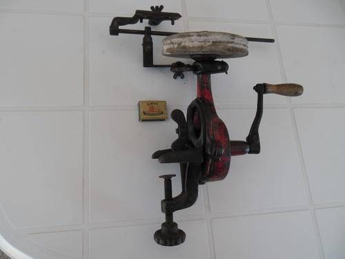 very old and heavy cast iron knife sharpener rare