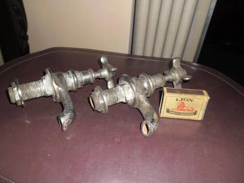 pair very old wash basin taps well used