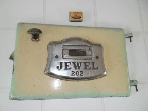 old Jewel 202 cast iron enamel front oven door weighs about 5,5kg