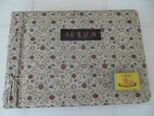 old family album with black and white photos