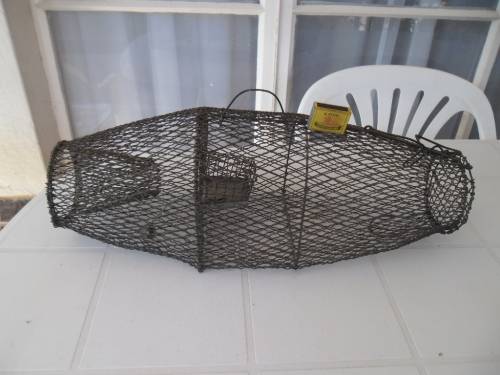 Rare large old metal rat trap size is 640mm long don¿t know if it is working see is what you get