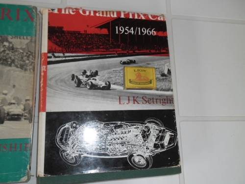 Very rare grand prix 1950¿s to 1960¿s hard cover with dust jackets books weighs 4kg postage R70