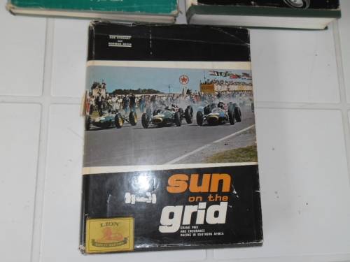 Very rare grand prix 1950¿s to 1960¿s hard cover with dust jackets books weighs 4kg postage R70