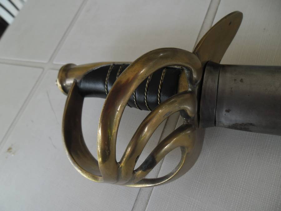 Rare Sword stamped India with brass hilt and metal scabbard total length 1065mm long