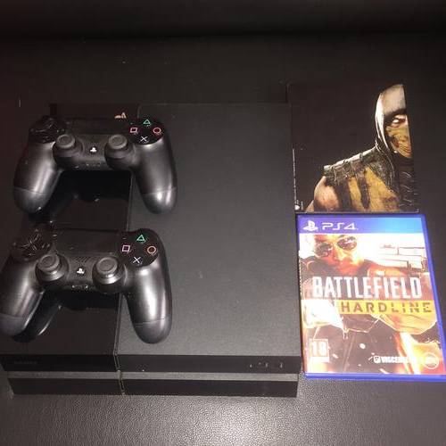 playstation 4 for sale with 2 remotes and 2 games