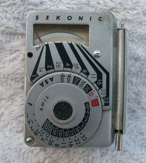 Vintage Sekonic light meter with leather case