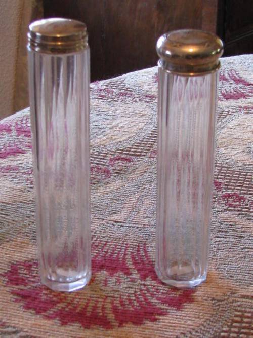 Two Hairpin Glass Bottles with Silver Tops