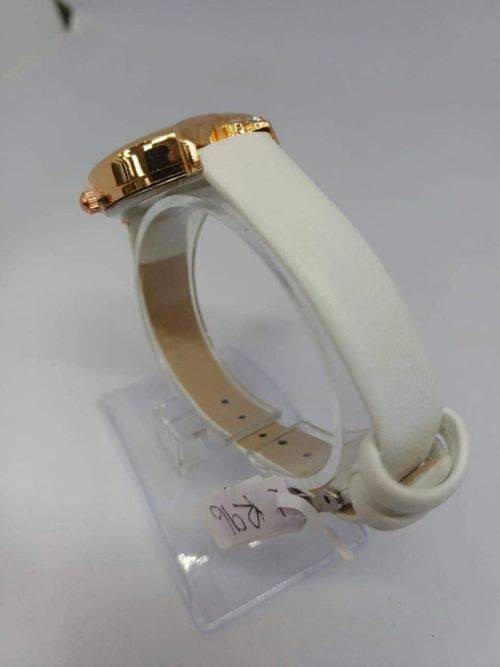 Royalty rose gold with white strap