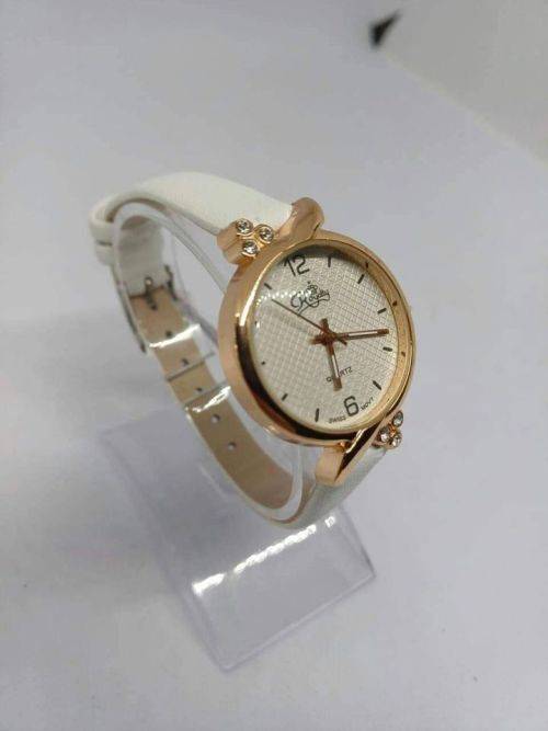 Royalty rose gold with white strap