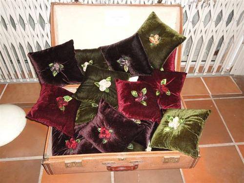 **QUAINT VELVET CUSHIONS WITH ROSE DETAIL**