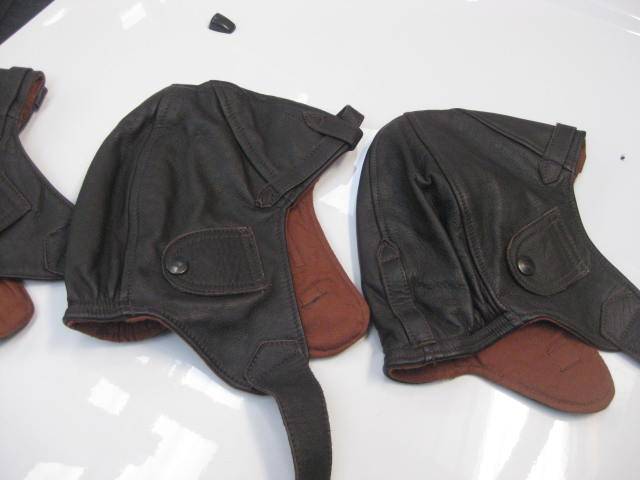 Leather helmets for roofless cars and planes