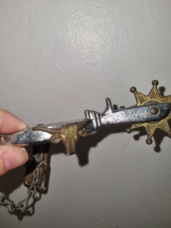 Antique Horse Riding Spur with bull detail