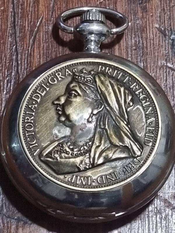 Pocket watch with replica of 1899 One Penny on one side