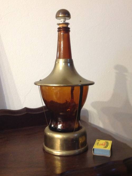 Amber and brass musical decanter pigeon
