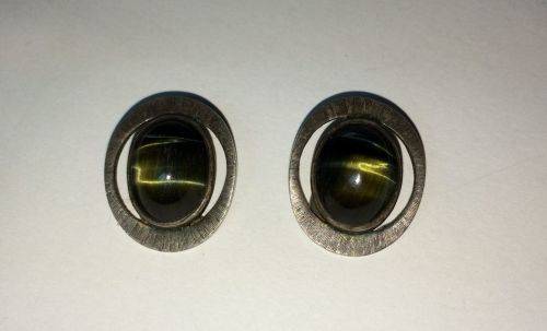 Vintage WWL  sterling silver clip on earrings with Cat's eye cabochon stones.